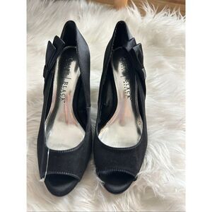 White House black market heels black with bow size 6.5 new but a bit of dry rot